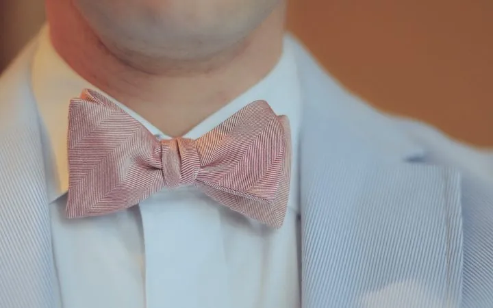 Close-up of a hand-tied bow tie