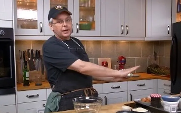Glen cooking in his home kitchen studio