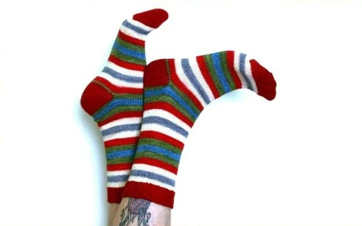 A pair of hand-knit striped socks