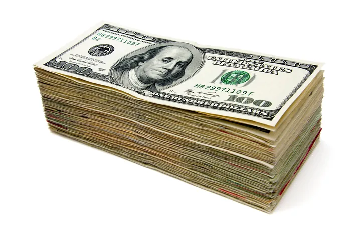 A thick stack of hundred-dollar bills